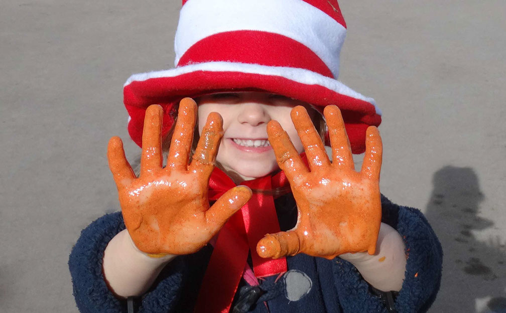 photo showing girl with glitter hands at Longscroft