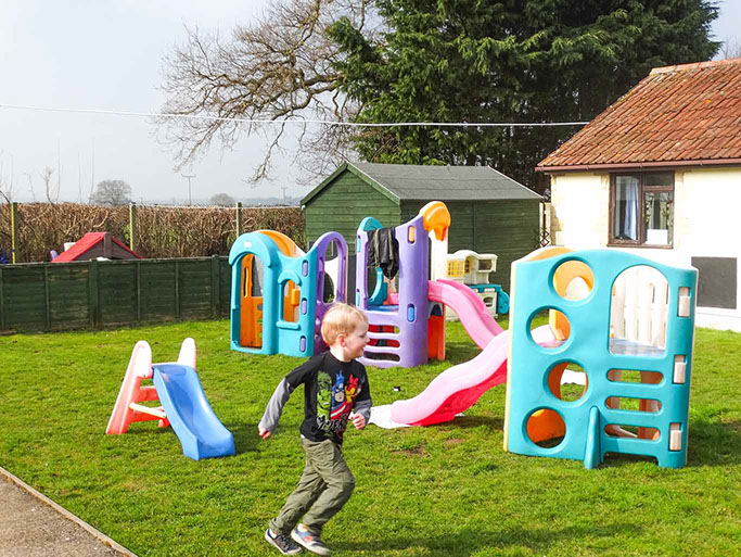 photo showing boy running around at Longscroft